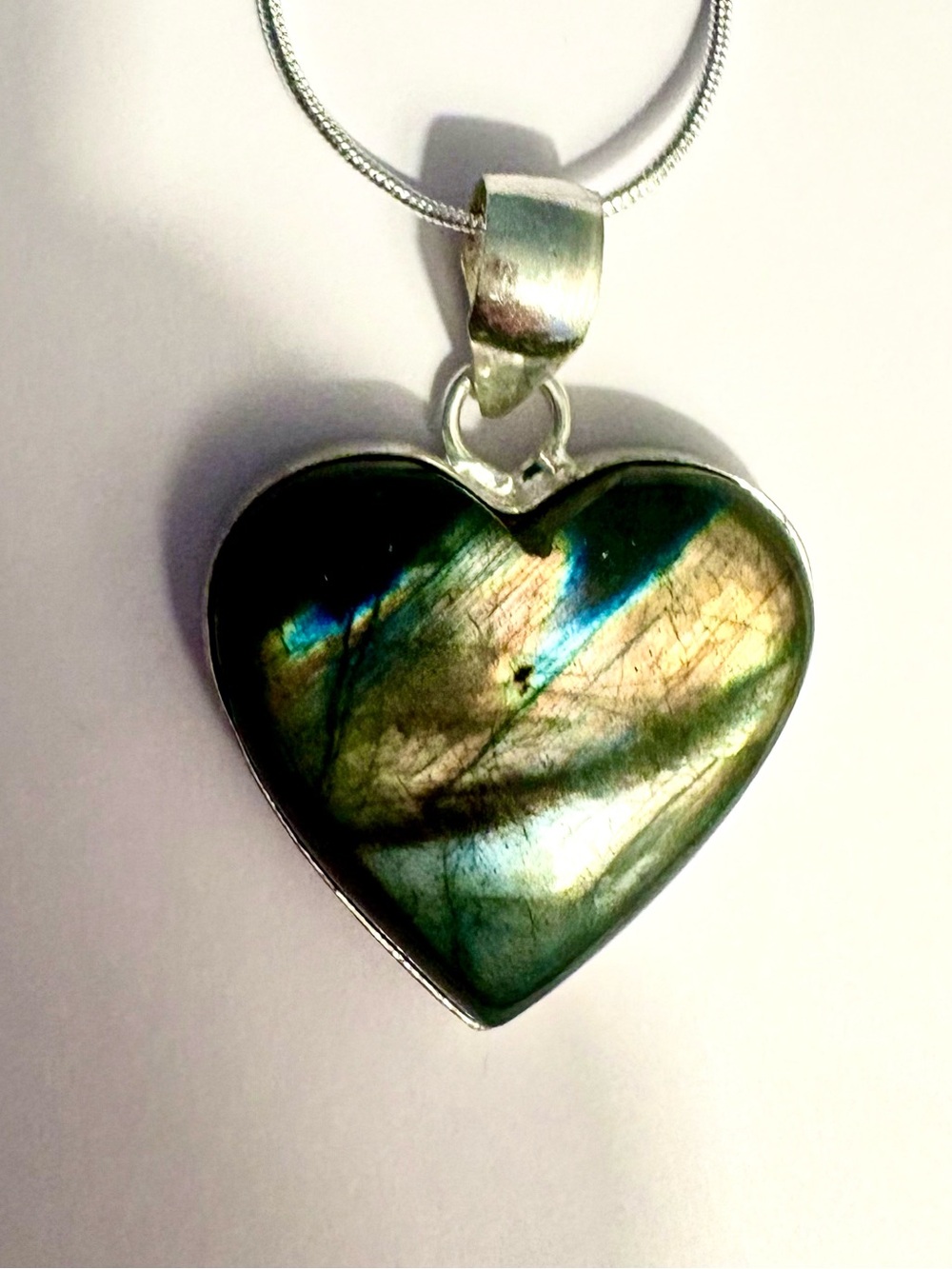 Beautiful 1 3/4 heart shaped, 925 marked, Labradorite pendant on a silver chain